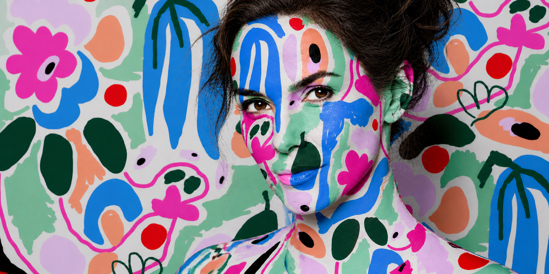 A close editorial portrait of a confident woman completely camouflaged in an original FOKE print